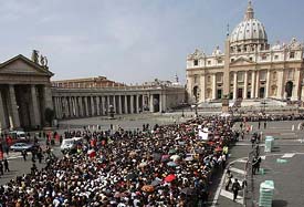 Thousands of pilgrims queue oustside Saint Peters Basilica to see the late Pope John Paul II lying in state at the Vatican on Tuesday. 