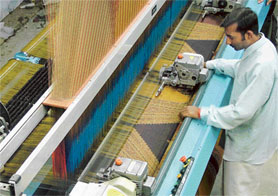 Out of the hundreds of warp knitting machines set up in the city, only about six or seven power loom weaving units are left now.