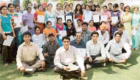 Participants at an entrepreneurship development programme with their certificates at the valedictory function on Wednesday