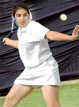 Simer in action during the final of AITA Talent Series Tennis Tournament held at Chandigarh Club on Thursday.