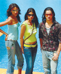 Kiran Vajpai, Tanvi Singh and Rahul Choudhary strike a pose during a preview of the new faces in the modelling world. The Fashion Design Council of India (FDCI) announced the names of 13 models who will walk the ramp during the Lakme India Fashion Week 2005, to be held at the Grand Hotel in the Capital. 