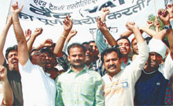 Delhi traders demonstrating against VAT at Delhi Secretariat in the Capital. 