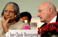 President of World Travel and Tourism Jean Claude Baumgarten talks to President A.P.J. Abdul Kalam at the Fifth Global Travel and Tourism summit in  New Delhi on Friday. 