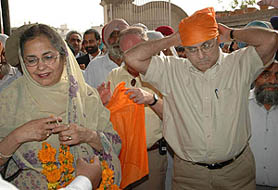 British Columbia Health Minister Ujjal Dosanjh and his wife, Raminder, pay obeisance at a gurdwara in Guru Nanak Mission Hospital before the inauguration of an AIDS awareness programme in Jalandhar on Friday.