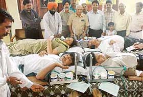 Volunteers donate blood at Dr Ambedkar Bhavan in Chandigarh