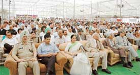 Participants, including High Court Judges and Deputy Commissioner Anurag Verma, at a seminar organised during a national lok adalat in Ludhiana