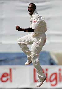 West Indies fast bowler Dwayne Bravo celebrates after dismissing South Africas Jacques Rudolph on the second day of the second Test in Port-of-Spain on Saturday