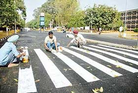 Work in progress on Monday to refurbish the PGI for Prime Minister Manmohan Singhs visit