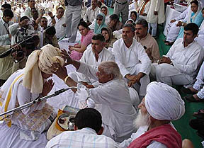 Shruti, daughter of the late Haryana Agriculture Minister Surender Singh, accepts a pagri at a ceremony at Bhiwani on Monday.