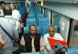 The Minister of State for Railways, Mr Naran Bhai J. Rathwa, interacts with mediapersons before he flagged off the first metre-gauge AC chair car manufactured by the Rail Coach Factory at Kapurthala on Monday. 
