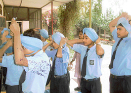 Students of Golden Bells Public School, Sector 77, participate in a turban- tying 