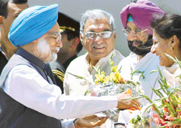 Prime Minister Manmohan Singh being greeted at the Chandigarh airport by Congress leaders Ambika Soni, Punjab Chief Minister Amarinder Singh and his Haryana counterpart Bhupinder Singh Hooda on Wednesday.