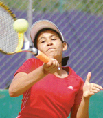 Saadgi Rajani of Gujarat returns a shot during AITA talent series at the Lake Club, Chandigarh, on Wednesday.