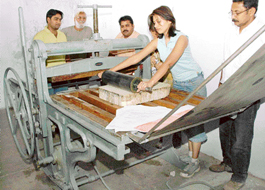 Print making students of Government Art College, Sector 10, learn to use the new litho press which dates back to Lahore Art College days. The press was recently assembled by the college authorities who claim it is one of the largest presses in the country.