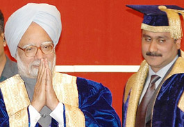 Prime Minister Dr Manmohan Singh greets audience at the annual convocation of the PGI on Wednesday while the Union Health Minister, Dr Anbumani Ramadoss, looks on.