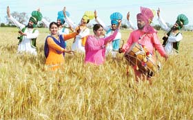 Bhangra and Giddha mark Baisakhi celebrations in a village near Ludhiana