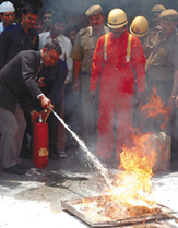 Personnel of the Delhi Fire Service demonstrating firefighting techniques during the Fire Service Week 2005 in the Capital on Thursday.