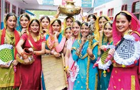 Students of Spring Dale Senior Secondary School, Ludhiana, in colourful traditional costumes on the occasion of Baisakhi