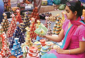 Colourful Khurja pottery on display at Karigiri Craft Bazar in Nehru Sidhant Kendra