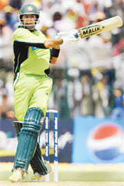 Heroic moves: Shoaib Malik has been in the news for his performance on the pitch and his phone marriage to a Hyderabadi girl. 