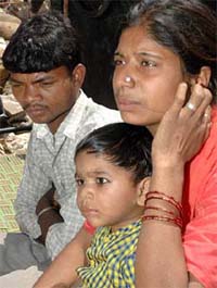 Karamjit Kaur and Raj Kumar with their son