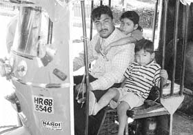 Sunny Kumar and his children who are waiting for their mother