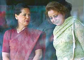 Sehba Musharraf, wife of President Musharraf, and Congress President Sonia Gandhi arrive to watch the sixth and final one-day cricket match between India and Pakistan in New Delhi