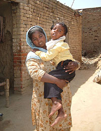 A brain-damaged Buta Singh with his mother at Bhakta Bhaika village in Bathinda.