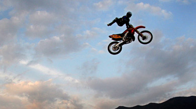 Tommy Clowers Tomcat jumps on his motorcycle during a freestyle motocross show in Valencia, Venezuela