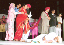 A scene from  the play, Dhukdey Kaleeray.