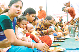 Devotees have langar on the occasion of Ram Navami at Radha Krishan Temple, Sector 40, Chandigarh, on Sunday.