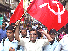 Political activists from the Nepal Communist Party United Marxist shout anti-monarchy slogans in Patan on Monday