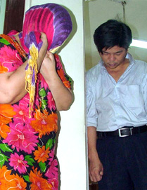 Mrs Ravindera Kaur Kukreja, resident of Bangkok and Toe Koon San, resident of Kuala Lumpur