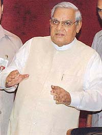 Former Prime Minister AB Vajpayee arrives to attend the BJP Parliamentary Party meeting in New Delhi