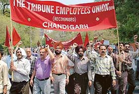 Media employees during a demonstration to raise the demand for a new wage board in New Delhi