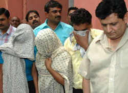 Kanwaljit Singh with call girls in police custody in the Capital on Wednesday. 