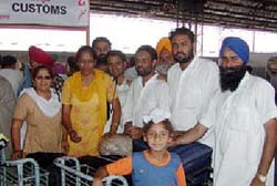 Sikh pilgrims at Attari Railway Station after their return from Pakistan on Wednesday.  ANI