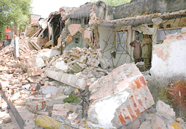 Shops demolished by the enforcement staff at the Mansa Devi shrine complex in Panchkula on Thursday.