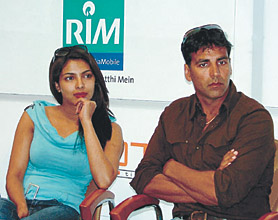 Cine stars Priyanka Chopra and Akshay Kumar at the Reliance India Mobile facility in the Capital on Thursday. The event coincided with the release of the film Waqt.