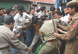 The police arrests supporters of the APHC (Geelani) during a Milad-un-Nabi procession in Srinagar on Friday.