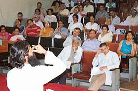 Swami Dhirendracharya performs yoga at the PGI, Chandigarh