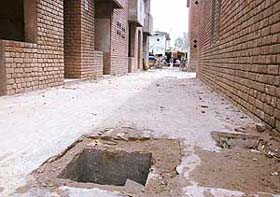 A missing manhole cover in Labour Colony No. 4, Chandigarh, where electrical and sanitary fittings worth lakhs have been stolen from unoccupied houses