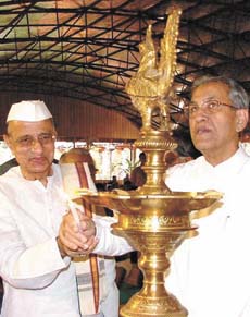 B. N. Singh and Delhi Lt-Governor B.L. Joshi lighting a lamp to mark the launch of The Melody of Peace, a dance drama in traditional style in Malayalam