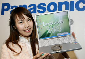 A campaign girl for Japanese electronics giant Matsushita Electric Industrial, known for its Panasonic and National brands, displays the companys new laptop