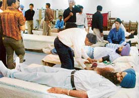 Teachers and students of Guru Nanak Polytechnical College donate blood at a camp organised by the CMC, Ludhiana