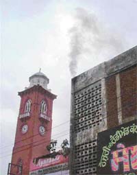 A generator emanates thick smoke near Clock Tower Chowk in Ludhiana