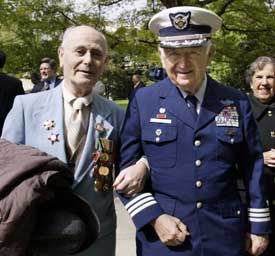 World War II veteran Bernard Cohn from the USA  and Russian veteran Miron Magidman (88) of Baltimore walk after a wreath-laying ceremony at the Arlington National Cemetery in Washington