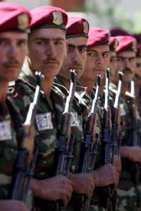 Syrian soldiers parade during a farewell ceremony at Riyyak military base in the Bekaa valley 