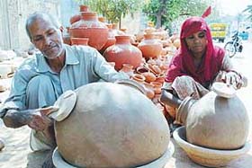 Potters make earthen pots in Naraingarh