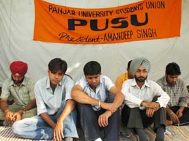 Students of the University Institute of Engineering and Technology sit on an indefinite fast outside the Vice-Chancellors office at Panjab University on Friday. 